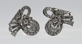 A fine pair of Art Deco design diamond earrings.