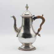 An 18th century Old Sheffield fused plate coffee pot with wooden handle, stamp on