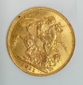 A George V 1911 gold full Sovereign.