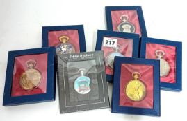 A collection of heritage pocket watches, boxed. (51)