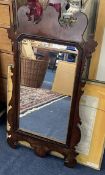 A George III mahogany framed Mirror, measuring 95cm x 54cm.