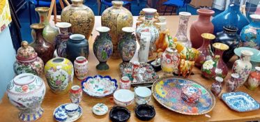 A quantity of mainly reproduction Japanese and Chinese porcelain, to include three horses, vases,