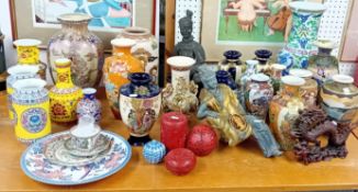 A quantity of mainly reproduction Chinese porcelain and statues, to include vases, figures, etc (