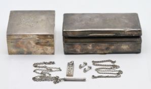 A silver 20th century propelling pencil on a chain, hallmarked, together with two silver cigarette