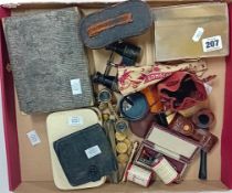 A mixed lot containing opera glasses, threepenny bracelet, gold mounted cigarette holder, pipes,