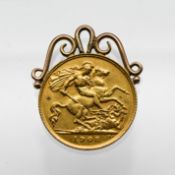 A George V 1908 gold Half Sovereign, mounted on a pendant, weight 4.5g.