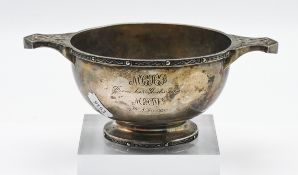 A silver quaich with stylised beast handles, hallmarked London 1927, silver weight 8.2oz.