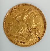 An Edward VII 1908 gold half Sovereign.