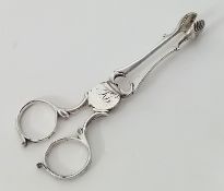 A pair of 19th century silver sugar nips, hallmarked, maker RM, silver weight 1.22oz.