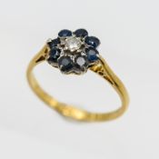An 18ct sapphire and diamond ring, overall weight 3g.