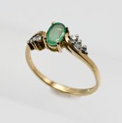 A 9ct emerald and diamond ring, overall weight 2g.