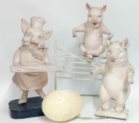 Three paper mâché butcher shop display pigs, from a Plymouth Butchers, one with a tray and one
