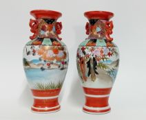 A pair of Japanese Vases, painted decoration of lake scene, height 25cm. (2)