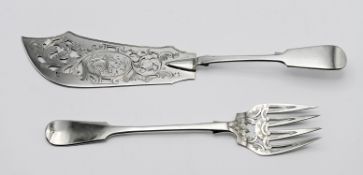 A Victorian pierced foliate design silver fish slice and fork, with engraved fish motif,