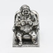 A Victorian novelty inkwell in the form of Mr Jorrocks, a character created by R. S. Surtees of a