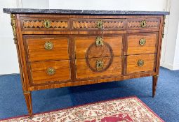 A late 18th century French 'Directoire' period commode, black marble topped chest with fitted