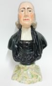 A Staffordshire pearl ware bust of John Wesley, on a painted marble effect base, height 29cm.