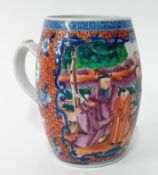 A Chinese Export Ware tankard, decorated with flowers and figures, height 13cm.