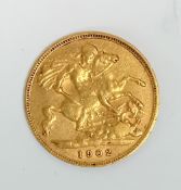 An Edward VII 1902 gold half Sovereign.