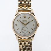 Rolex, a gents 9ct gold Precision wristwatch with gold bracelet, the dial with arabic and baton