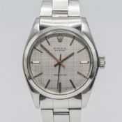 Rolex, a 1970's gents Oyster Precision stainless steel wristwatch, silver linen dial, serial