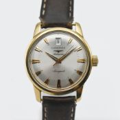 Longines, a 2005 gents 18ct cased Conquest automatic date wristwatch, silver gold baton dial,