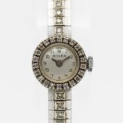 Rolex, a 1960's ladies 18ct white integral bracelet watch, diamond set bezel and bracelet, 17