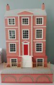 A large furnished Dolls House of a Georgian Town House, four storey, two sections together with