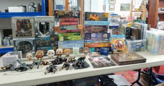 A collection of Lord Of The Rings boardgames, memorabilia and figures. Items to include a '