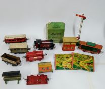A L.M.S 20V locomotive and Ingersoll Atlantic Radiolite Alarm, in addition to a transformer,