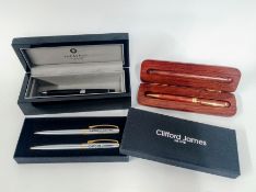 A 'Sheaffer' black rollerball pen with chrome trims, a 'Clifford James' pen and mechanical pencil