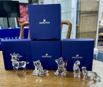 Swarovski Crystal Glass, a small collection including 'Raccoon', 'Otters' etc, all boxed (4).