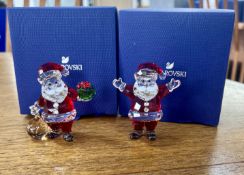 Swarovski Crystal Glass, two pieces including 'Santa Claus with Gift Bag' and 'Santa Claus - 2018'
