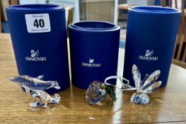Swarovski Crystal Glass, three pieces including 'Dolphin Baby', 'Christmas Ornament - Acorn' and '