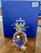 Swarovski Crystal Glass, Pineapple with silver leaf top, height approx 11cm, boxed.