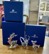 Swarovski Crystal Glass, three pieces including 'Winter Reindeer', 'Christmas Ornament - Stag'