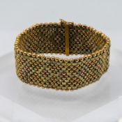 A 9ct yellow gold flexi two tone bracelet, approx 50.9g, length 19.5cm.