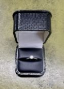 A diamond solitaire ring, diamond weight 0.52ct, colour F, clarity VS1, set in platinum, ring size