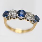 A diamond and sapphire five stone ring, set in 18ct yellow gold, size I/J.