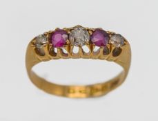 An 18ct yellow gold diamond and ruby five stone ring, size L/M.
