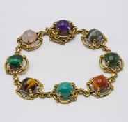 A gold multi gem stone set bracelet, set amethyst, jadeite, rose quartz etc, approx 25.6g, length