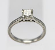 A platinum square shaped diamond solitaire ring, size K/L.