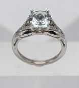 A 14k white gold aquamarine and diamond ring, marked Le Vian, size M.