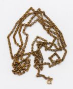 A gilt metal guard chain, length 134cm.