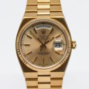 Rolex, a 1980's gents 18ct yellow gold Day-Date Oyster quartz wristwatch, with silvered gold baton