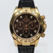 Rolex Daytona, a fine gents 18k gold and diamond Cosmograph, the black dial signed Oyster