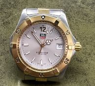 Tag Heuer, a gents Professional date two tone wristwatch, backplate numbers WK1120-0, DH7190.
