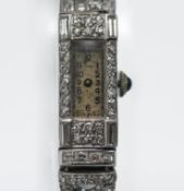 A fine platinum and diamond Art Deco ladies cocktail bracelet watch, set with baguette and round cut