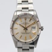 Rolex Date, a gents Oyster Perpetual, model 15210, stainless steel, engine turned bezel, stainless