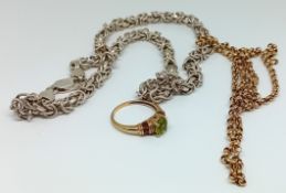 A 9ct gold chain, weight 4.8g, together with a silver chain, weight 1.4oz, and a yellow metal